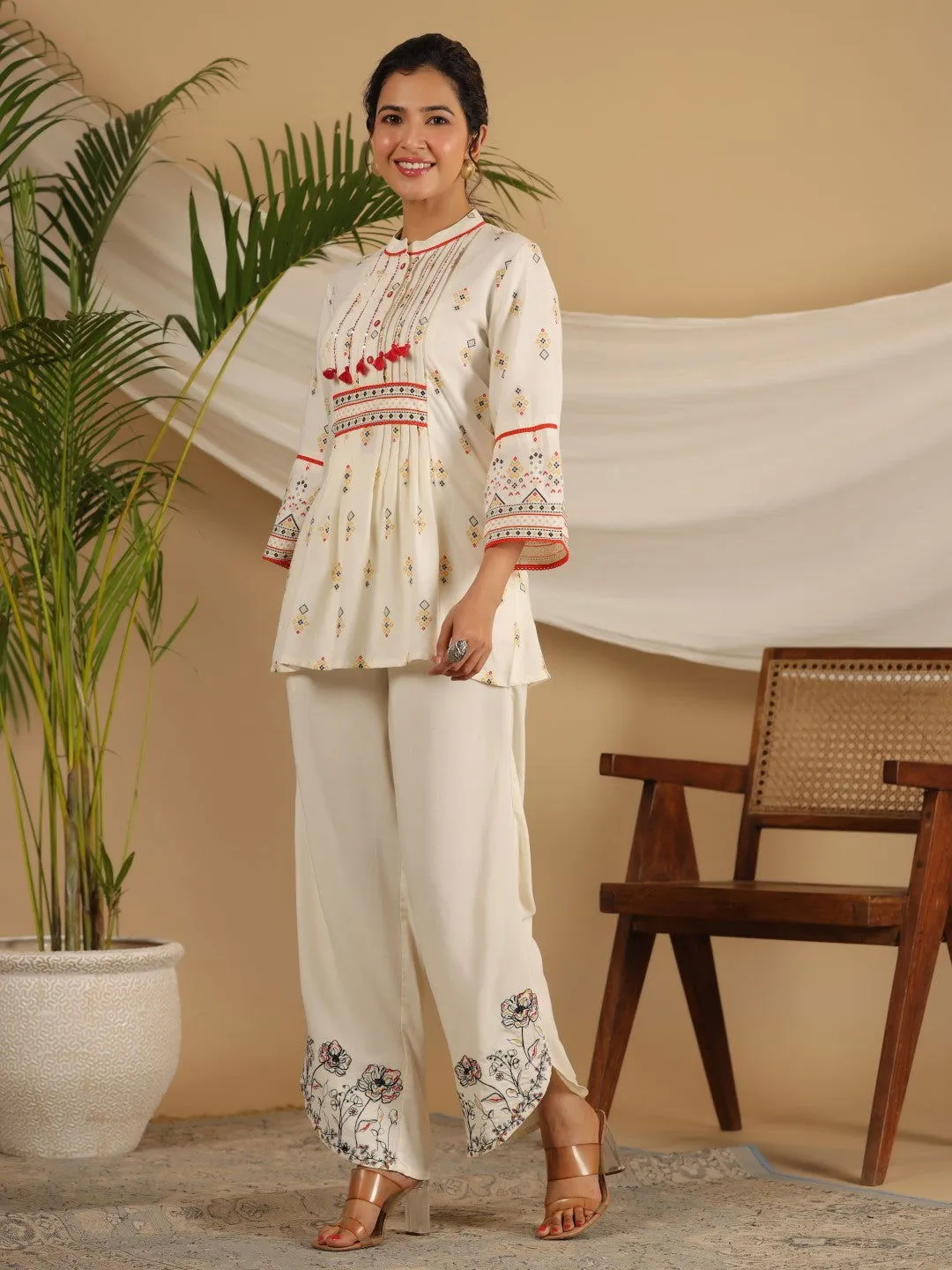 Jashvi  Rayon Ivory Tribal Printed A-Line Pleated Co-Ord Set With Sequenced Thread Work