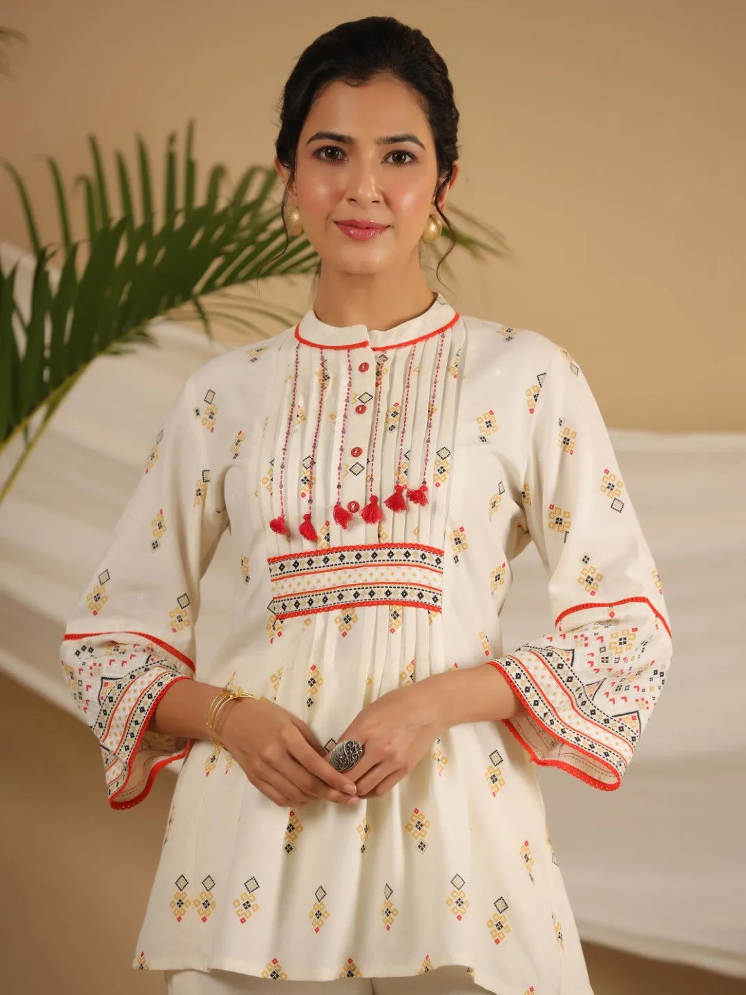 Jashvi  Rayon Ivory Tribal Printed A-Line Pleated Co-Ord Set With Sequenced Thread Work