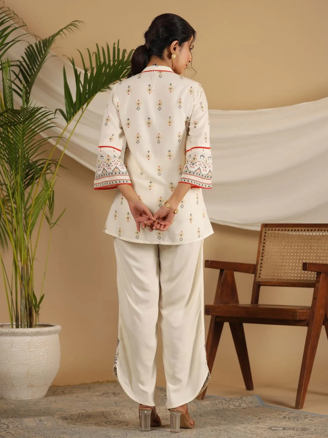 Jashvi  Rayon Ivory Tribal Printed A-Line Pleated Co-Ord Set With Sequenced Thread Work