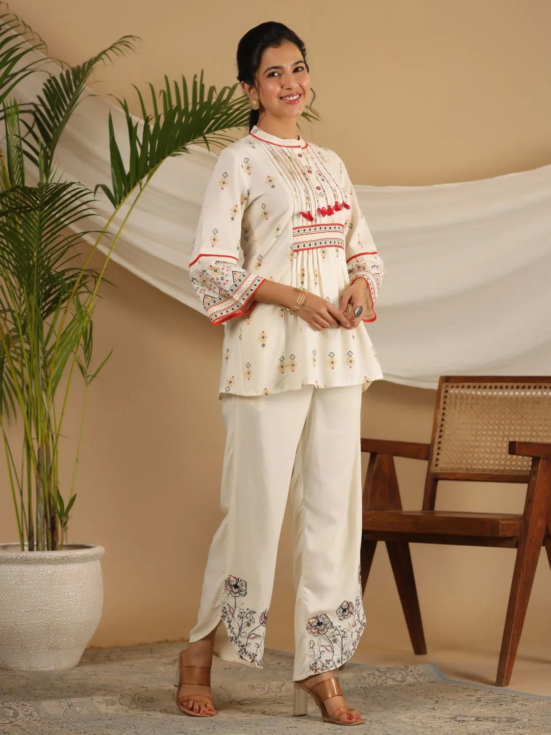 Jashvi  Rayon Ivory Tribal Printed A-Line Pleated Co-Ord Set With Sequenced Thread Work